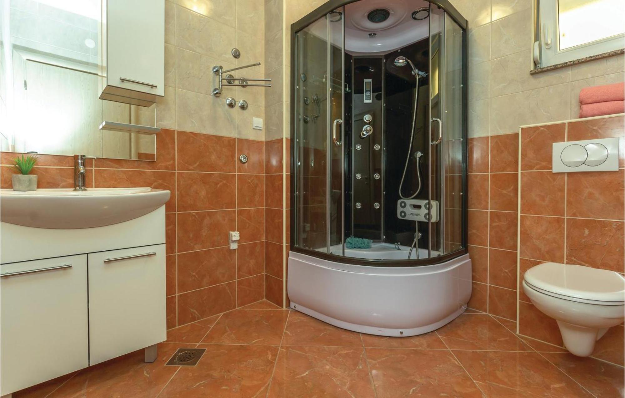 Nice Apartment In Krvavica With House Sea View Екстериор снимка