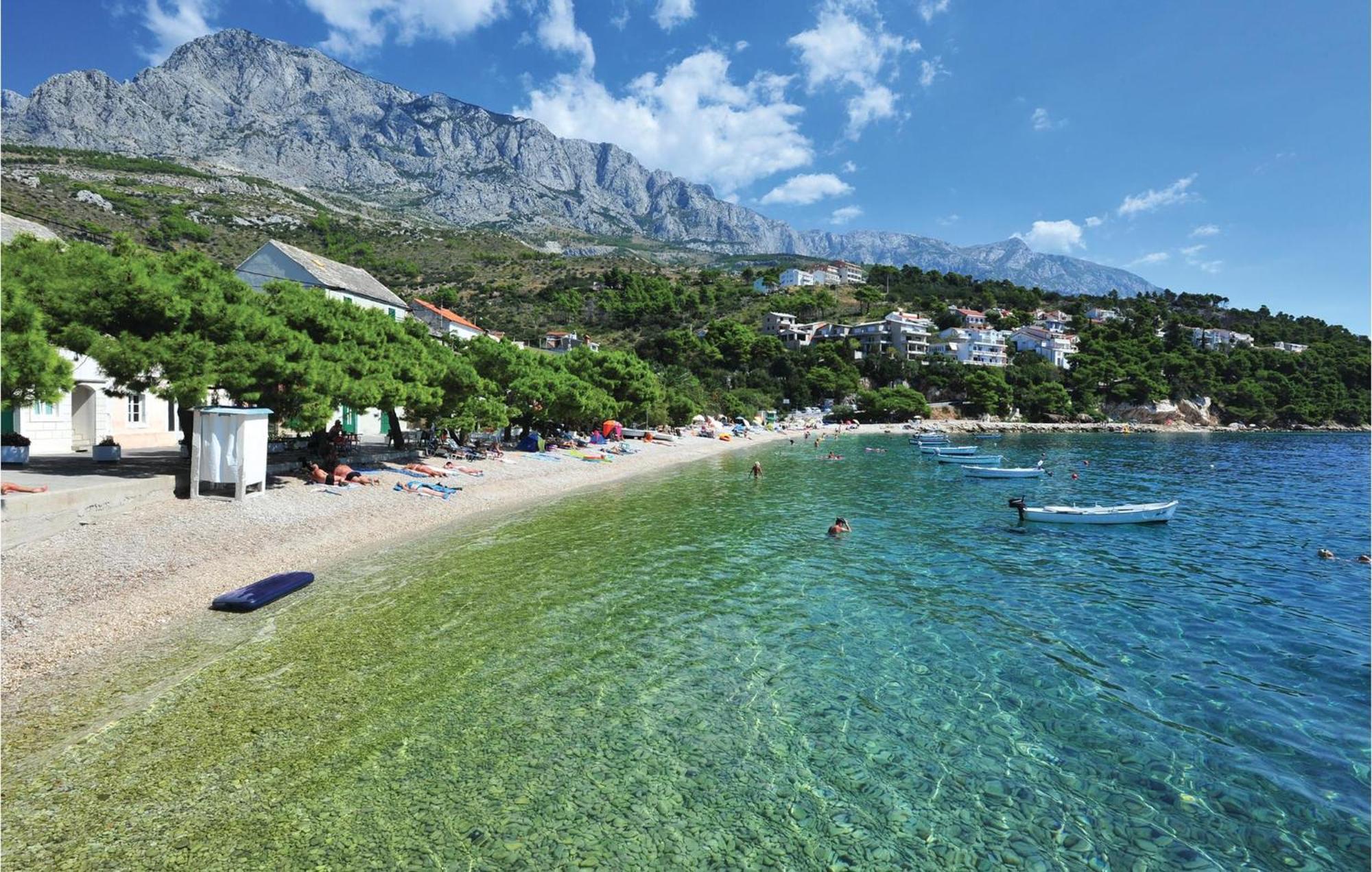 Nice Apartment In Krvavica With House Sea View Екстериор снимка