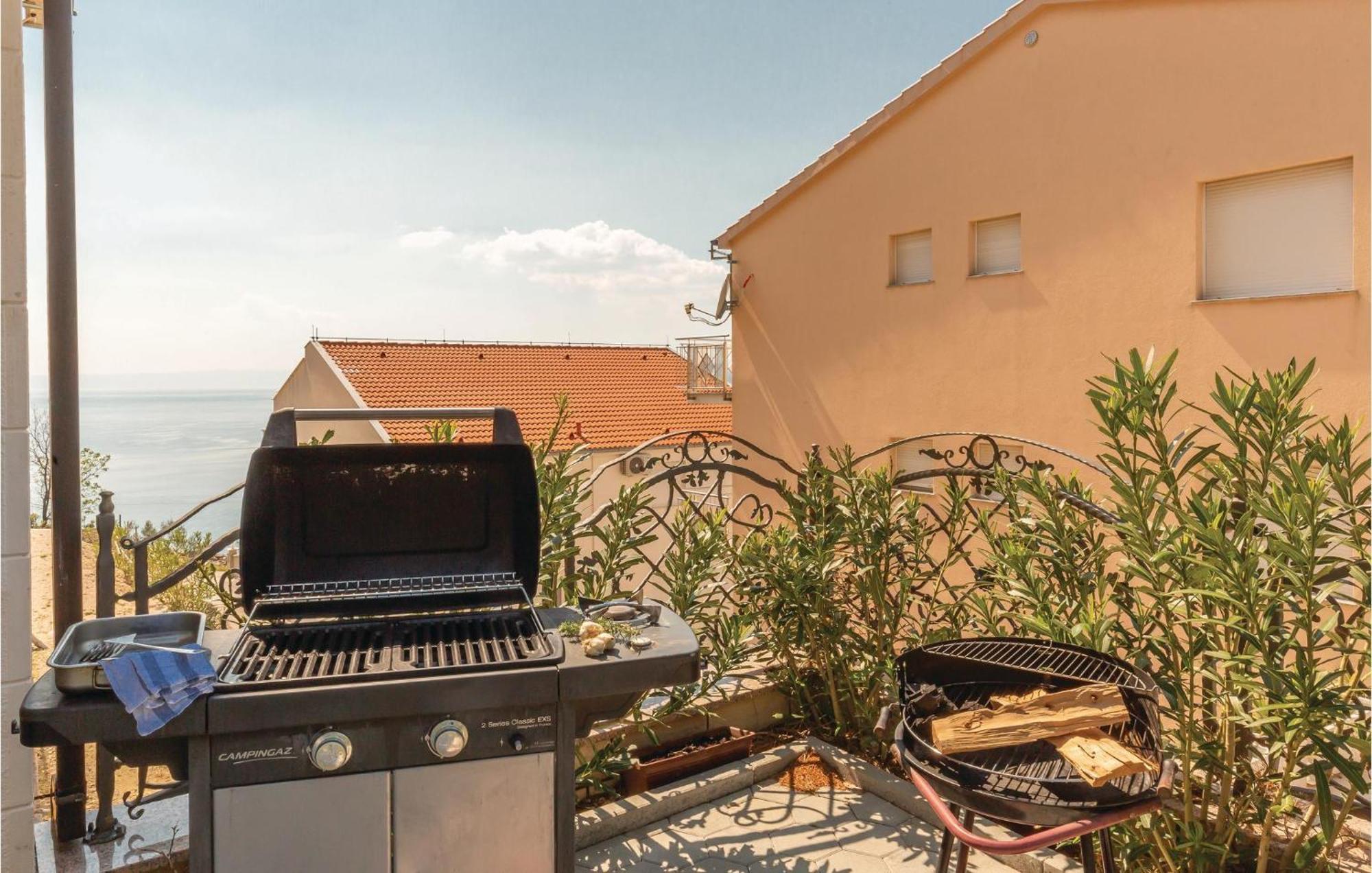 Nice Apartment In Krvavica With House Sea View Екстериор снимка