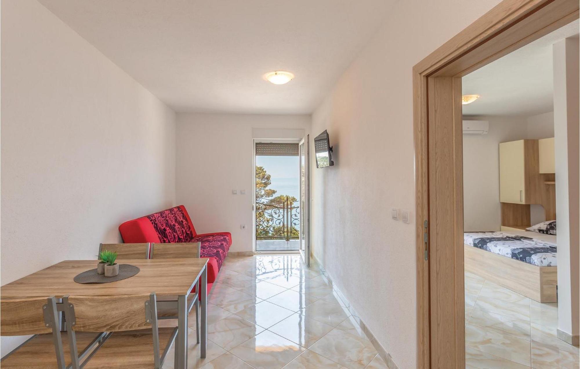 Nice Apartment In Krvavica With House Sea View Екстериор снимка